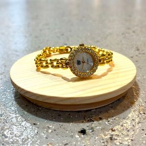 ELIZABETH TAYLOR RHINESTONE JEWELED FACE QUARTZ WATCH WITH GOLDTONE LINK BAND